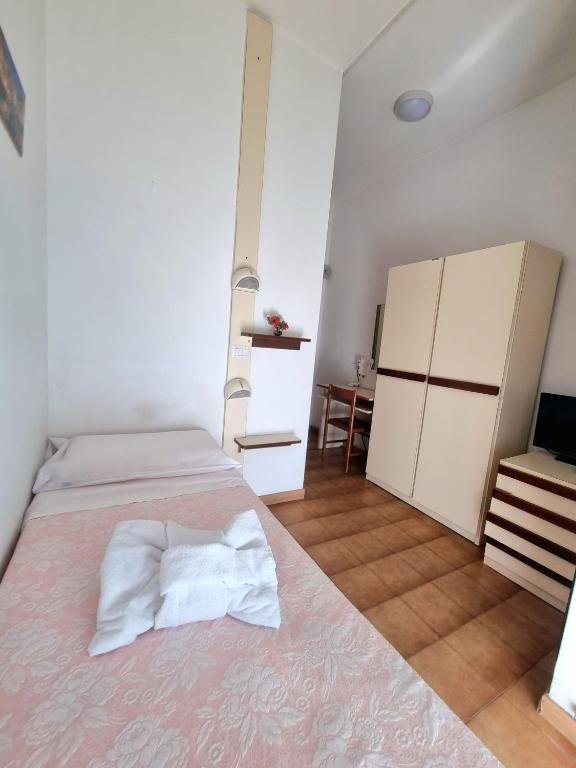 Postel nebo postele na pokoji v ubytování Due Gemelle