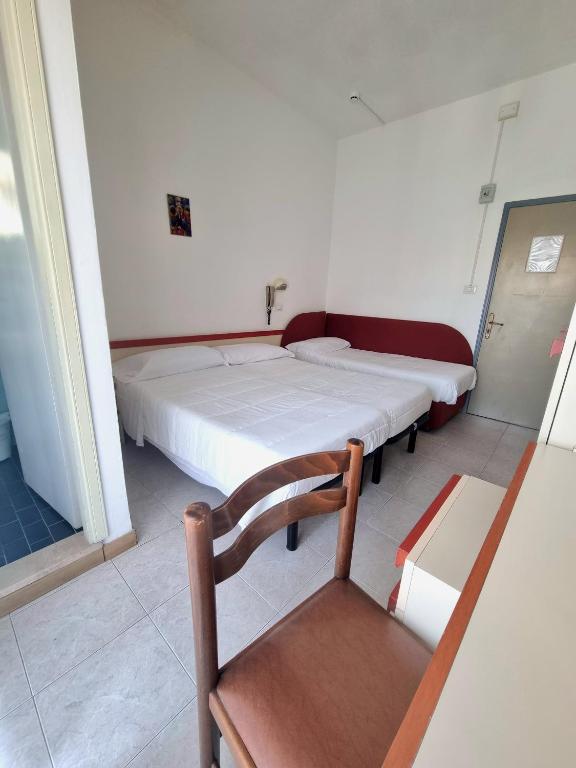 Postel nebo postele na pokoji v ubytování Due Gemelle