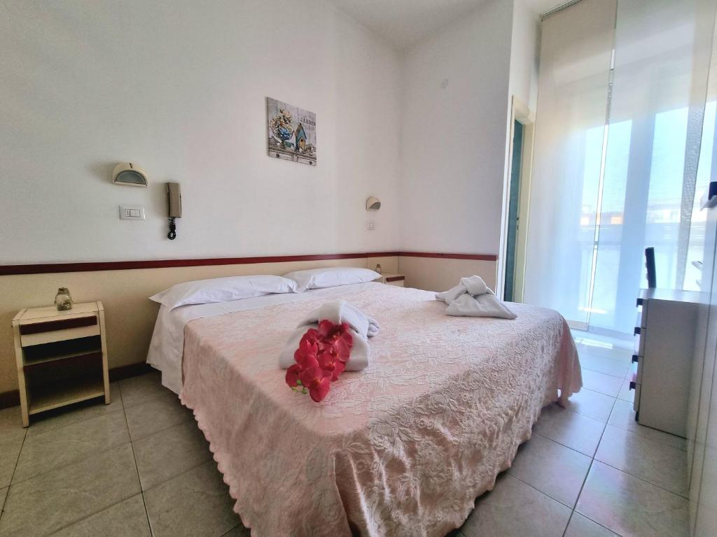 Postel nebo postele na pokoji v ubytování Due Gemelle