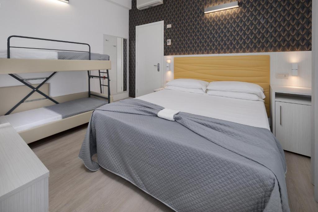 Letto o letti in una camera di Hotel Eiffel