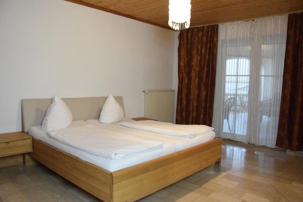 Postel nebo postele na pokoji v ubytování Appartmenthaus Rosenhof