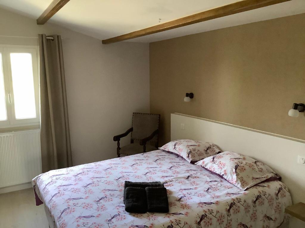 Postel nebo postele na pokoji v ubytování Autour Des Vignes B&B