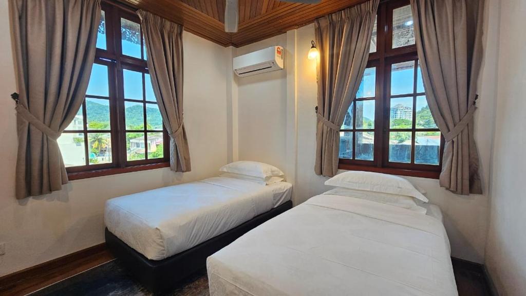 Postel nebo postele na pokoji v ubytování CASA ALRAWDAH