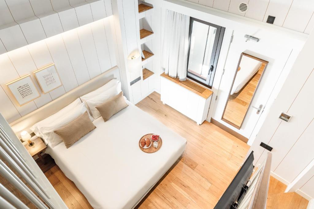 Postel nebo postele na pokoji v ubytování Casa Bella Gracia by Aspasios