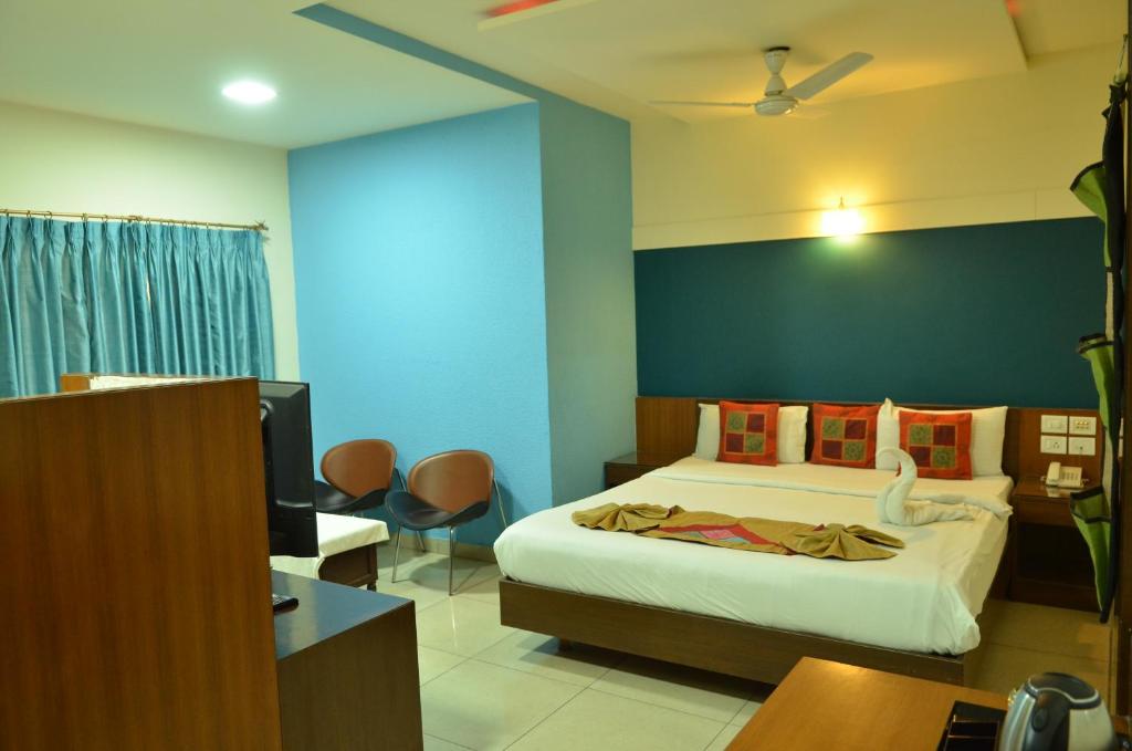 Krevet ili kreveti u jedinici u okviru objekta Cubbon Suites - 10 Minute walk to MG Road, MG Road Metro and Church Street