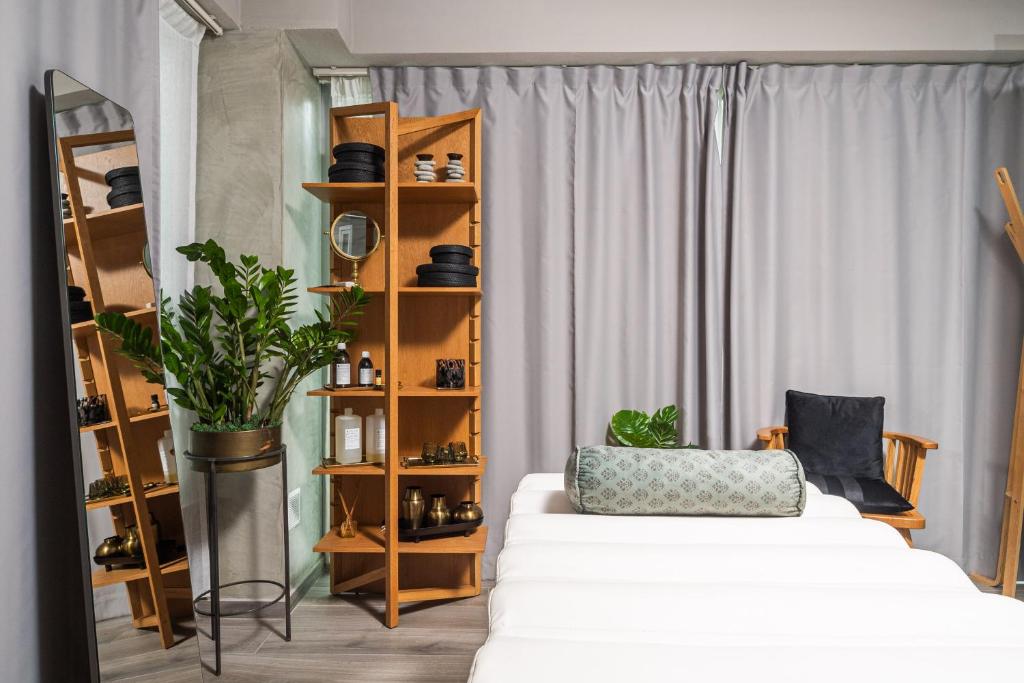 Postel nebo postele na pokoji v ubytování Oniros Residences