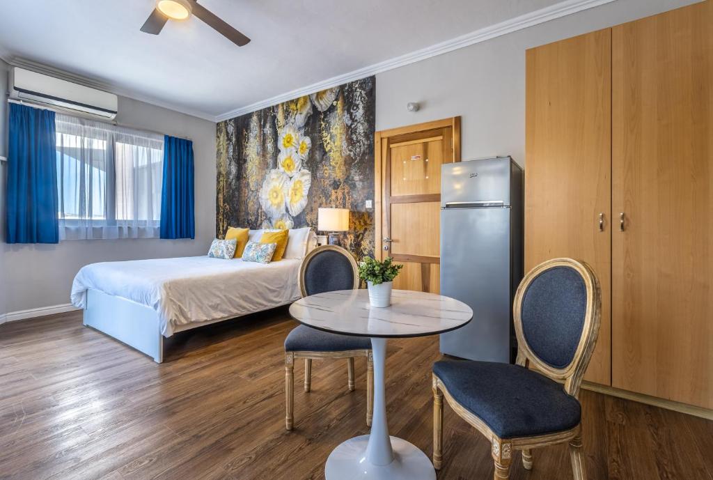 Postel nebo postele na pokoji v ubytování Park Lane Boutique Aparthotel