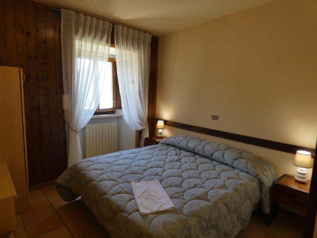 Postel nebo postele na pokoji v ubytování Dimora Fresilia Casa Vacanze