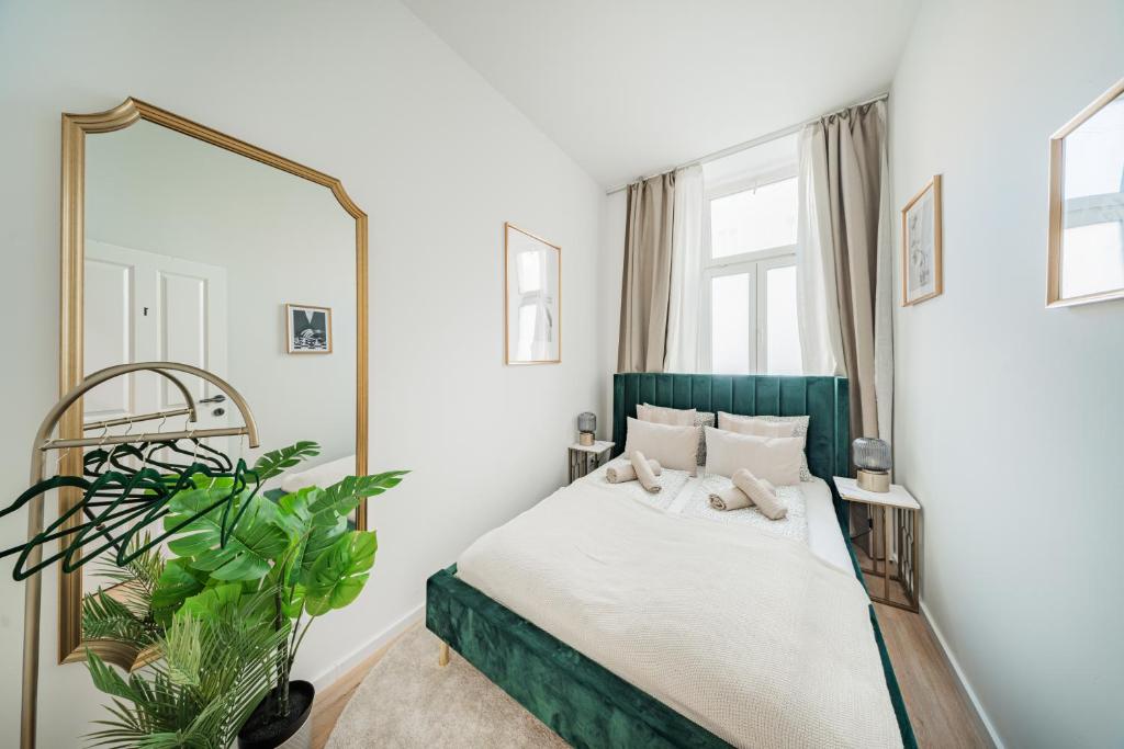 Postel nebo postele na pokoji v ubytování SEVEN Rooms Vienna