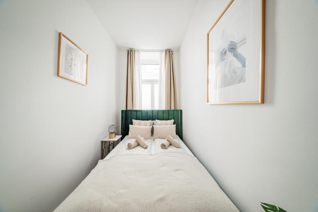 Postel nebo postele na pokoji v ubytování SEVEN Rooms Vienna