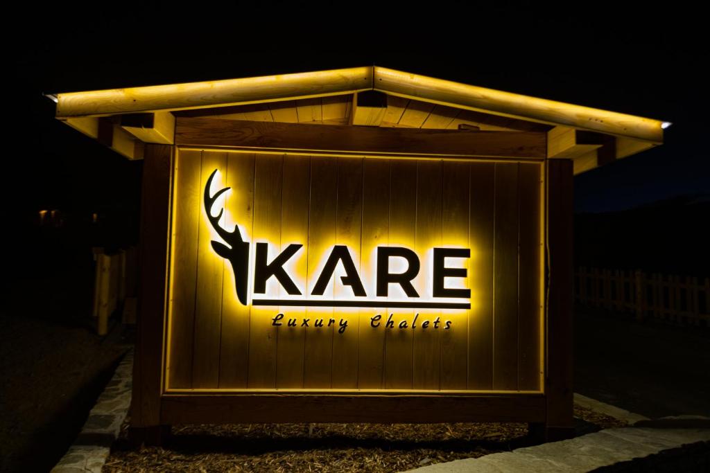 a sign that says kare on the side of a building at Kare Luxury Chalets in Tsigov Chark