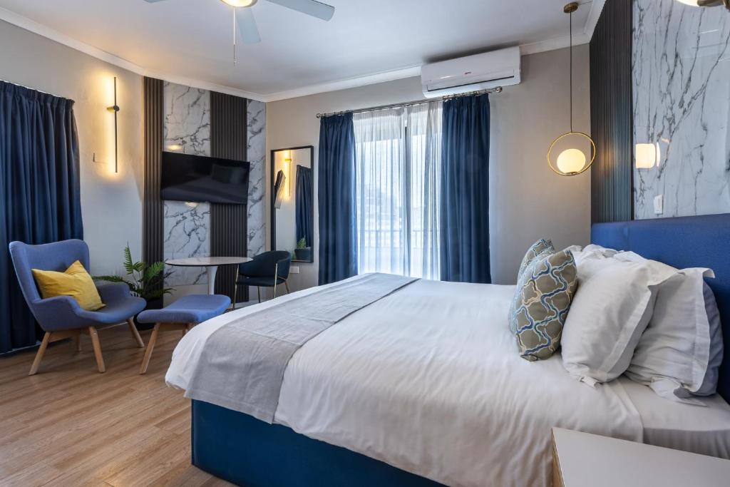 Postel nebo postele na pokoji v ubytování Park Lane Boutique Aparthotel
