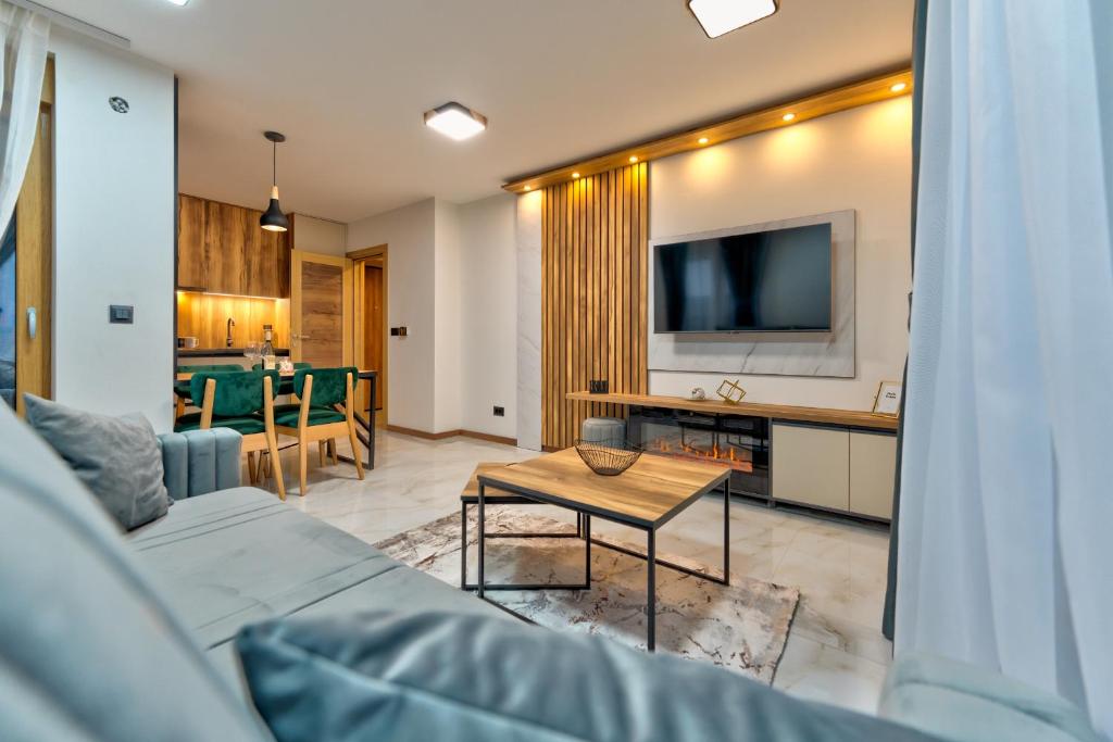 TV a/nebo společenská místnost v ubytování Golden Panorama Spa & Wellness