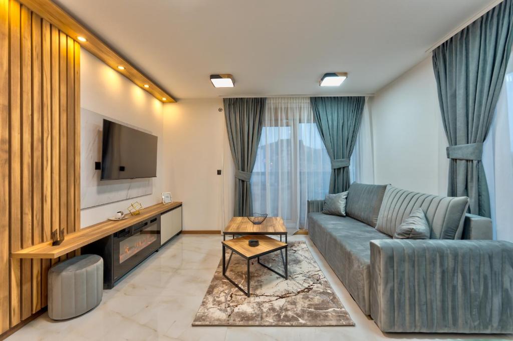 TV a/nebo společenská místnost v ubytování Golden Panorama Spa & Wellness