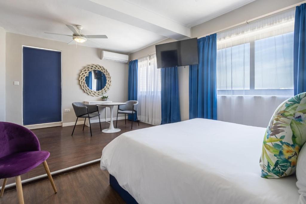 Postel nebo postele na pokoji v ubytování Park Lane Boutique Aparthotel