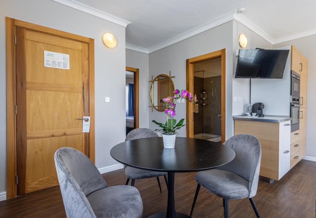 Kuchyň nebo kuchyňský kout v ubytování Park Lane Boutique Aparthotel