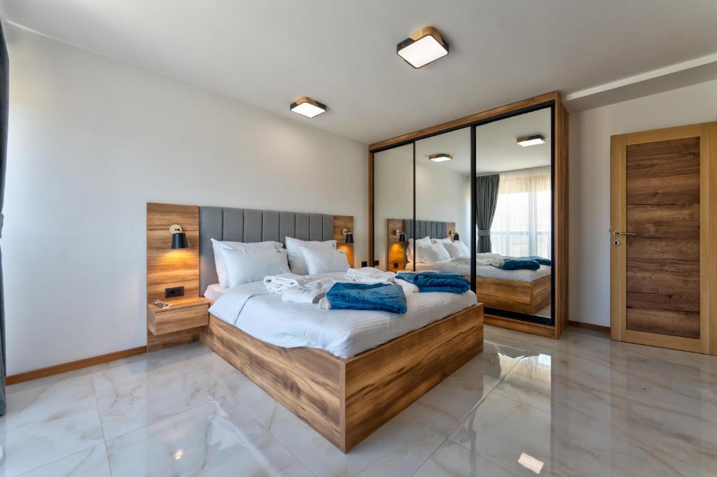 Postel nebo postele na pokoji v ubytování Golden Panorama Spa & Wellness