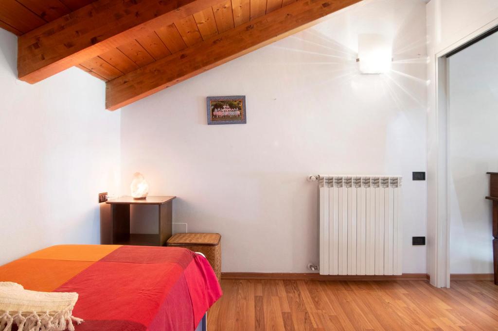 Postel nebo postele na pokoji v ubytování Casa vacanze vigna del Lago