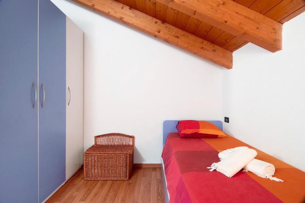 Postel nebo postele na pokoji v ubytování Casa vacanze vigna del Lago