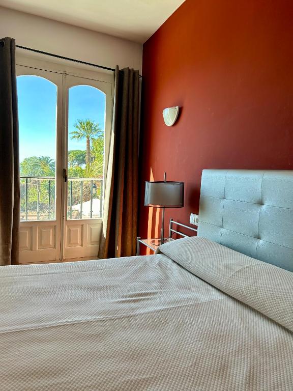 Postel nebo postele na pokoji v ubytování Apartamentos Balcón de Maro