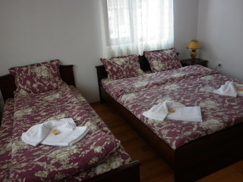 Postel nebo postele na pokoji v ubytování Guest House Mavrudieva