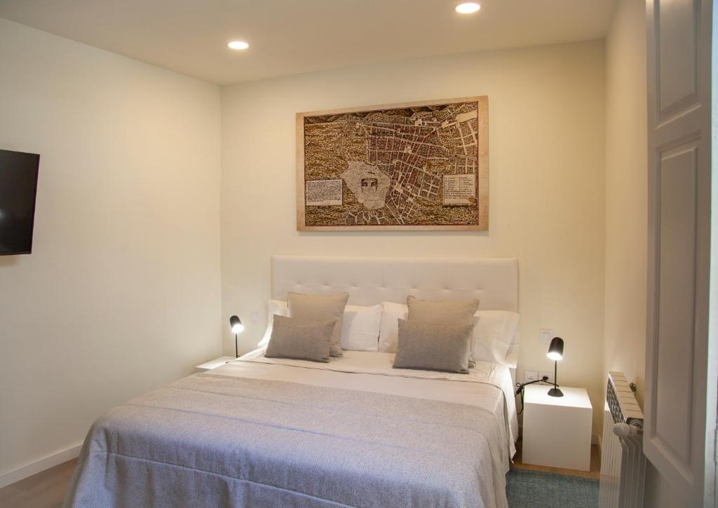 Nava Suites 객실 침대