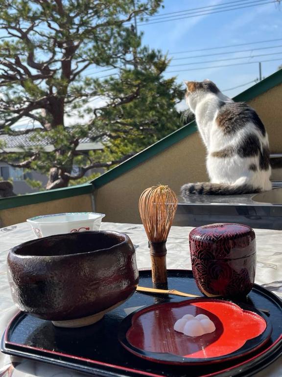 Domácí mazlíčci ubytovaní s hosty v ubytování Kyoto Wakouan Retro Stay