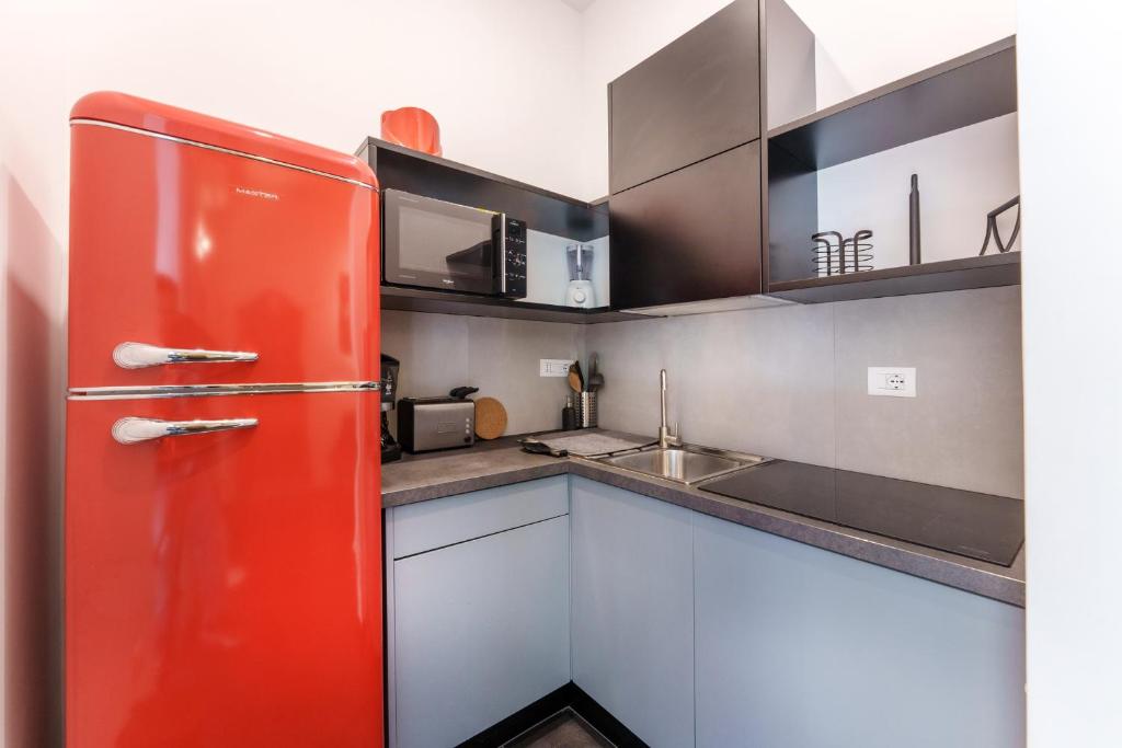 Kuchyňa alebo kuchynka v ubytovaní Casa Sasù - Design modern apartment