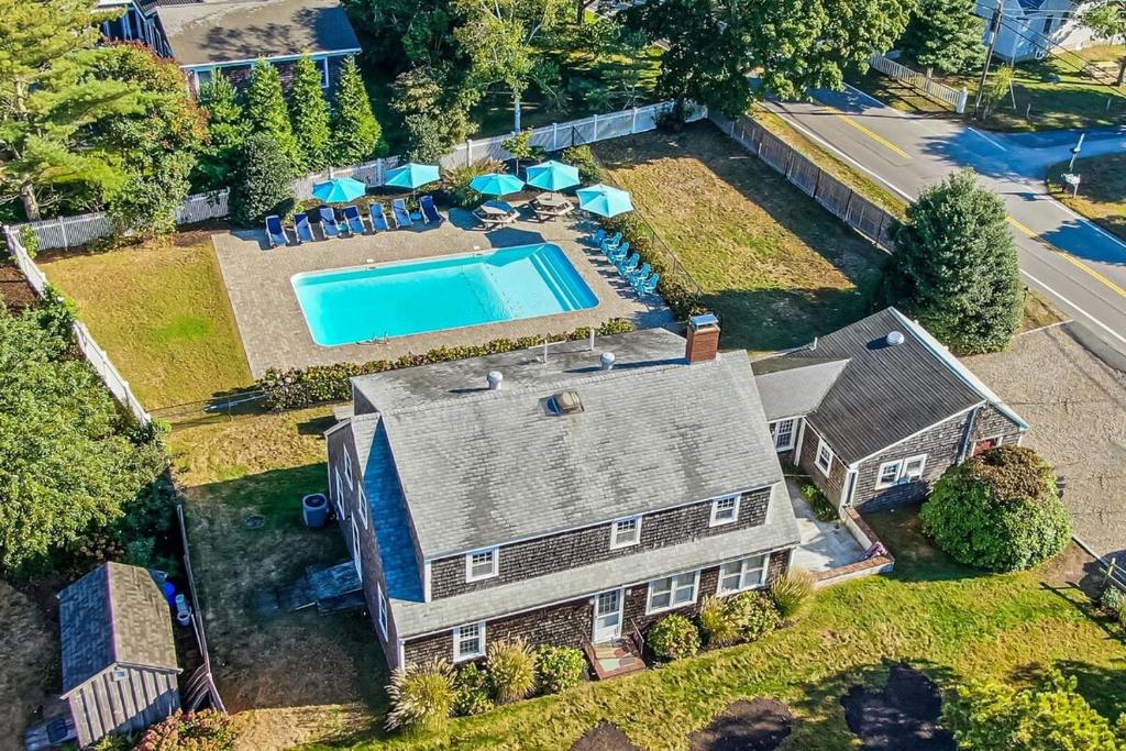 an overhead view of a house with a swimming pool at Heated Pool AC 1 2 Mile to Beach in Harwich