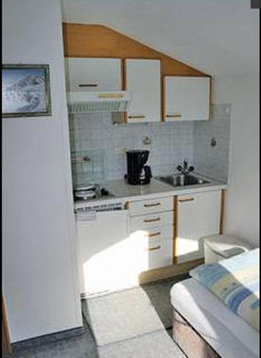 Kuchyň nebo kuchyňský kout v ubytování Gästehaus Resi