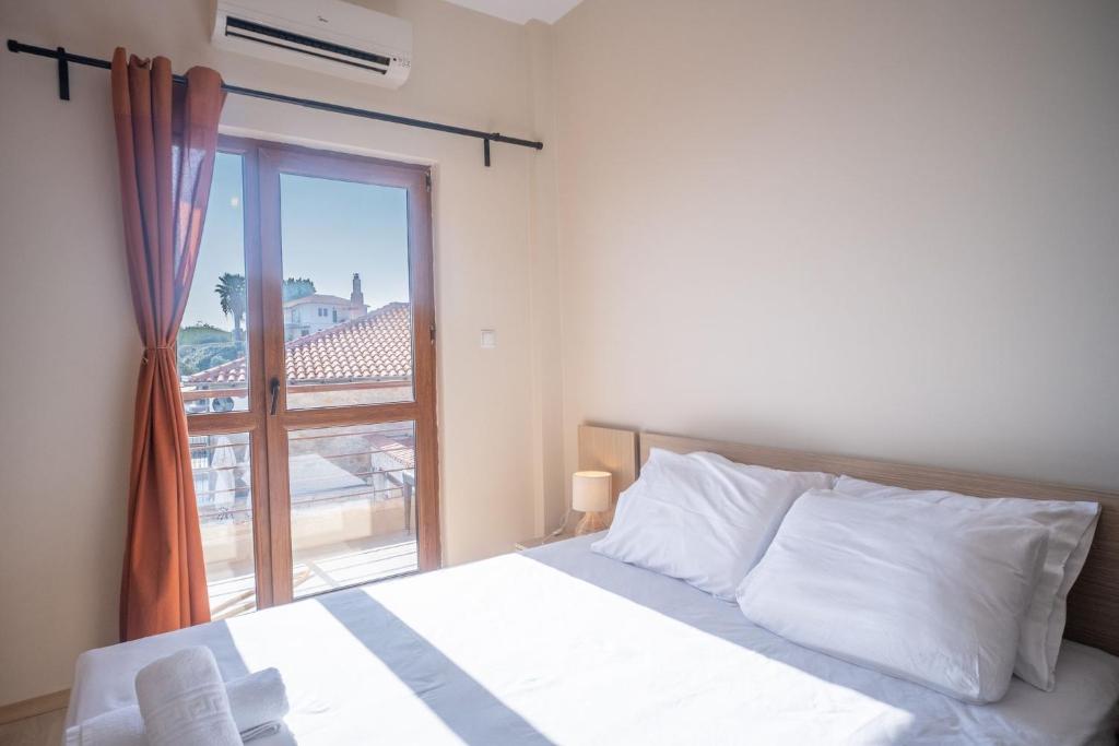 Postel nebo postele na pokoji v ubytování Brezza Marina House
