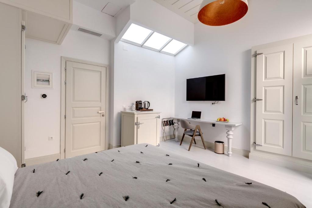 Postel nebo postele na pokoji v ubytování Skylight