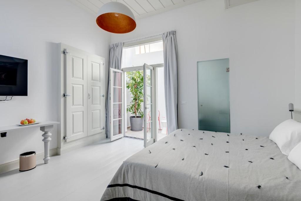 Postel nebo postele na pokoji v ubytování Skylight