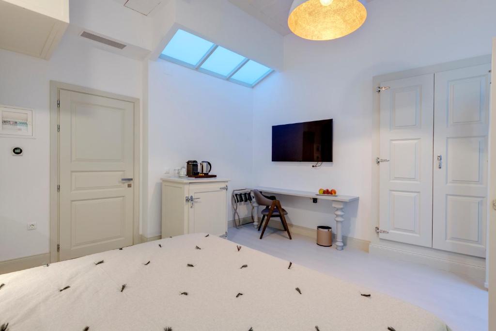 TV a/nebo společenská místnost v ubytování Skylight