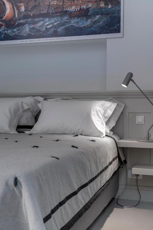 Postel nebo postele na pokoji v ubytování Skylight