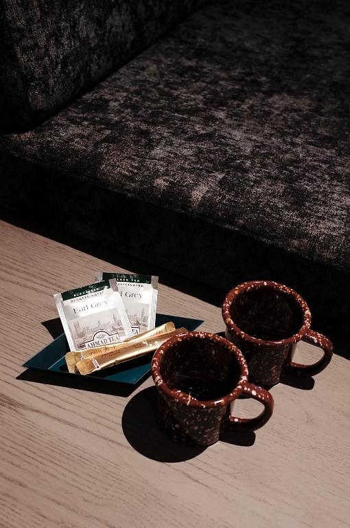 Příslušenství pro přípravu čaje a kávy v ubytování Hotel Rakuragu
