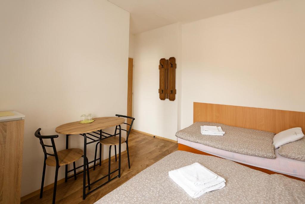 Postel nebo postele na pokoji v ubytování Penzion a restaurace na Křižovatce