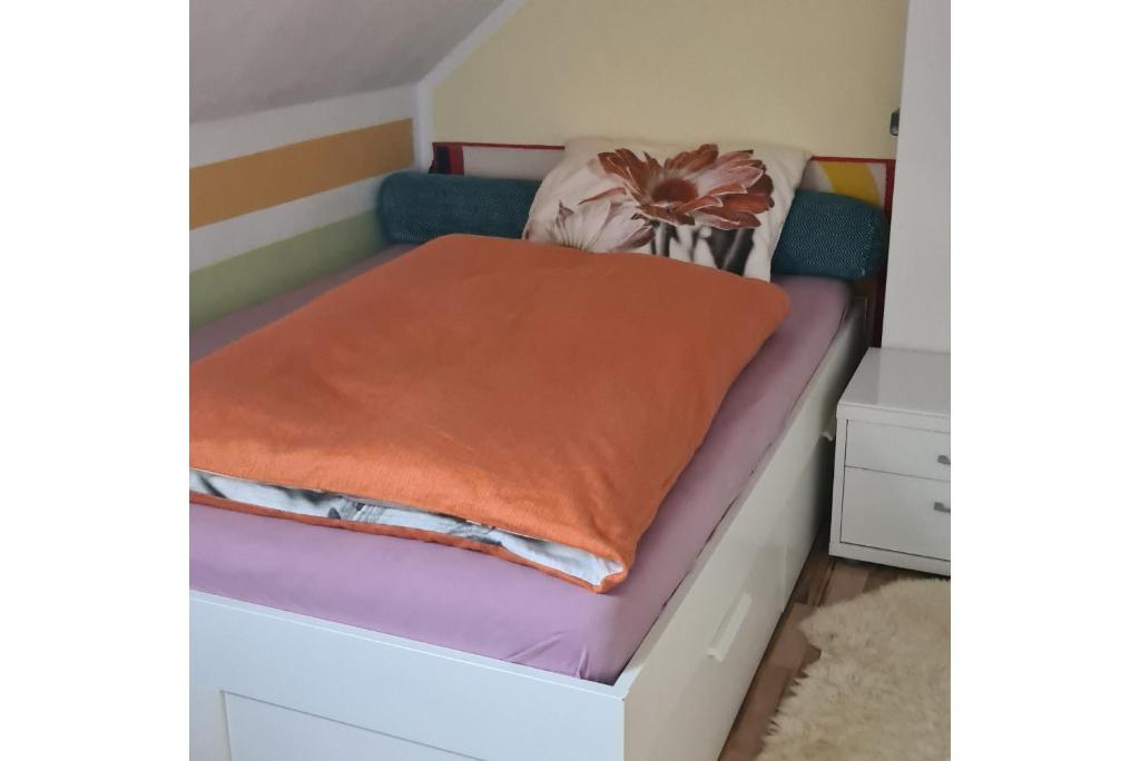 Ένα ή περισσότερα κρεβάτια σε δωμάτιο στο Private Rooms