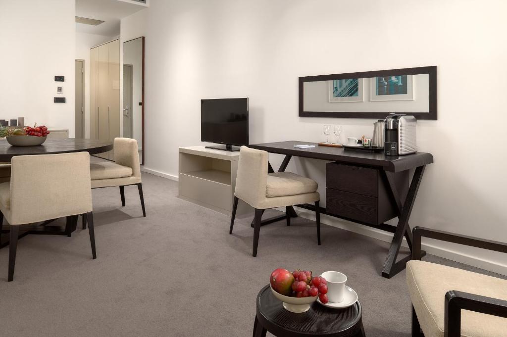 TV a/nebo společenská místnost v ubytování Hotel Atrium