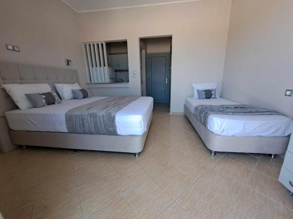 Posteľ alebo postele v izbe v ubytovaní house giota