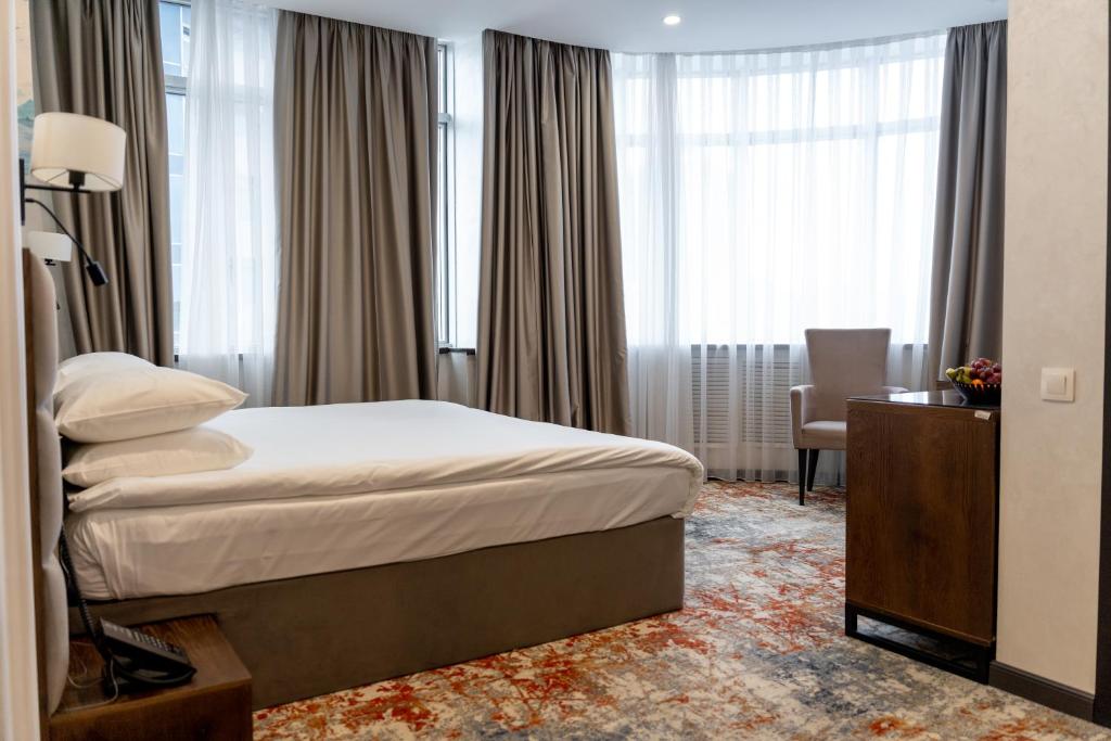 Grand Mildom Hotel - Camera Re Superiore