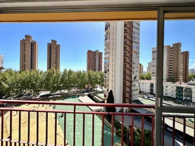 a balcony with a view of a city with tall buildings at La Oca - Aloturin Benidorm in Benidorm