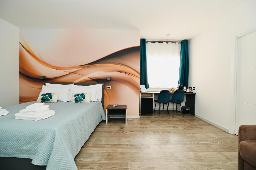 Postel nebo postele na pokoji v ubytování Vimini Corso Cavour - City Center