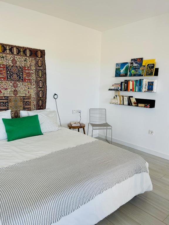 A bed or beds in a room at CASA MIRABEL