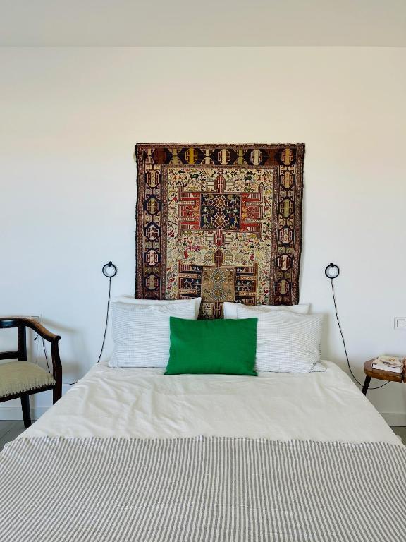 A bed or beds in a room at CASA MIRABEL