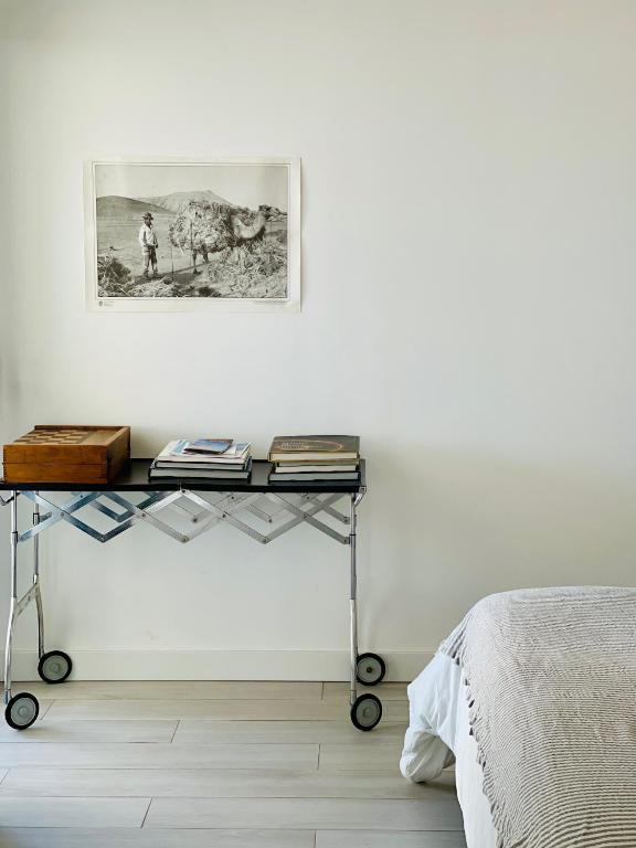 A bed or beds in a room at CASA MIRABEL