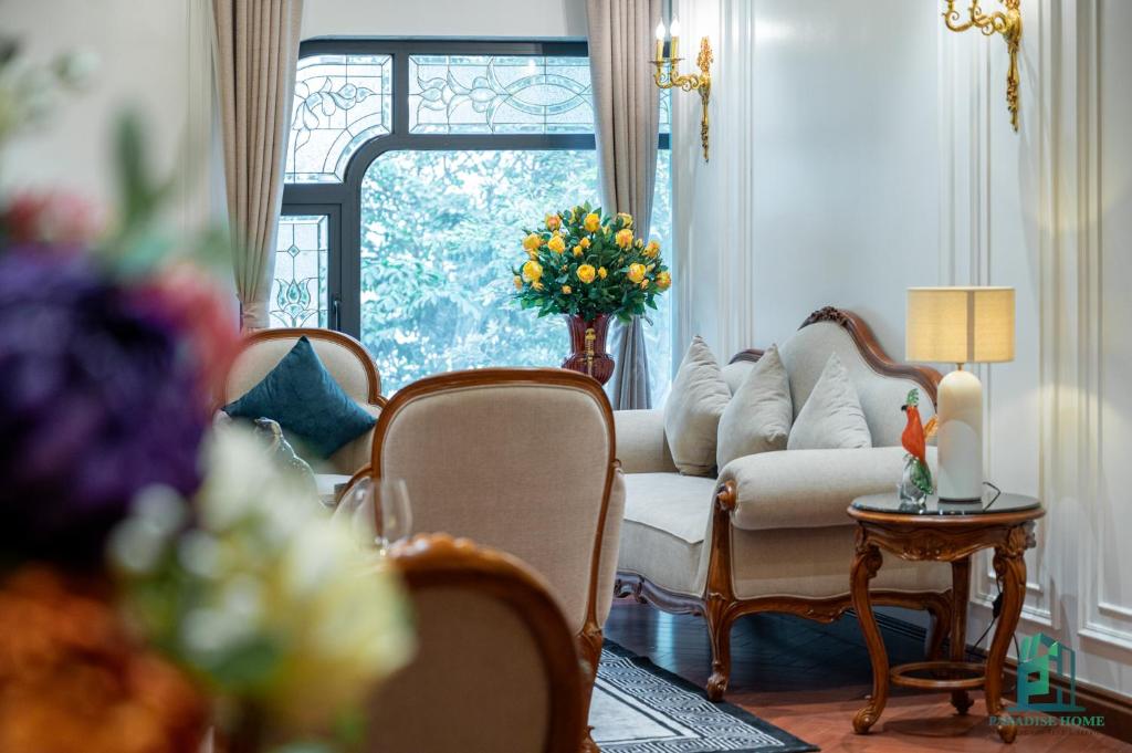 Posezení v ubytování Luxe Paradise Suite Hotel Trich Sai
