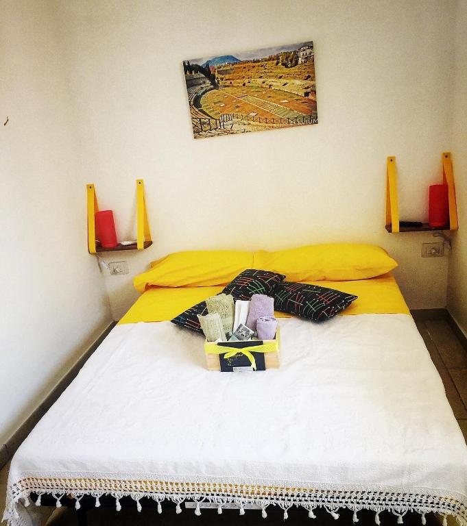 Postel nebo postele na pokoji v ubytování Casa sul Serapeo