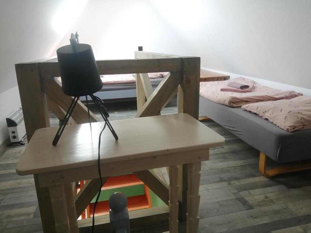 Postel nebo postele na pokoji v ubytování Włóczykijówka