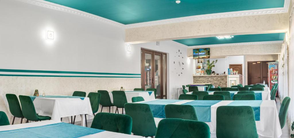 Restoran või mõni muu söögikoht majutusasutuses Pensiune Domeniul Stanca